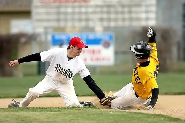 two baseball players playing baseball