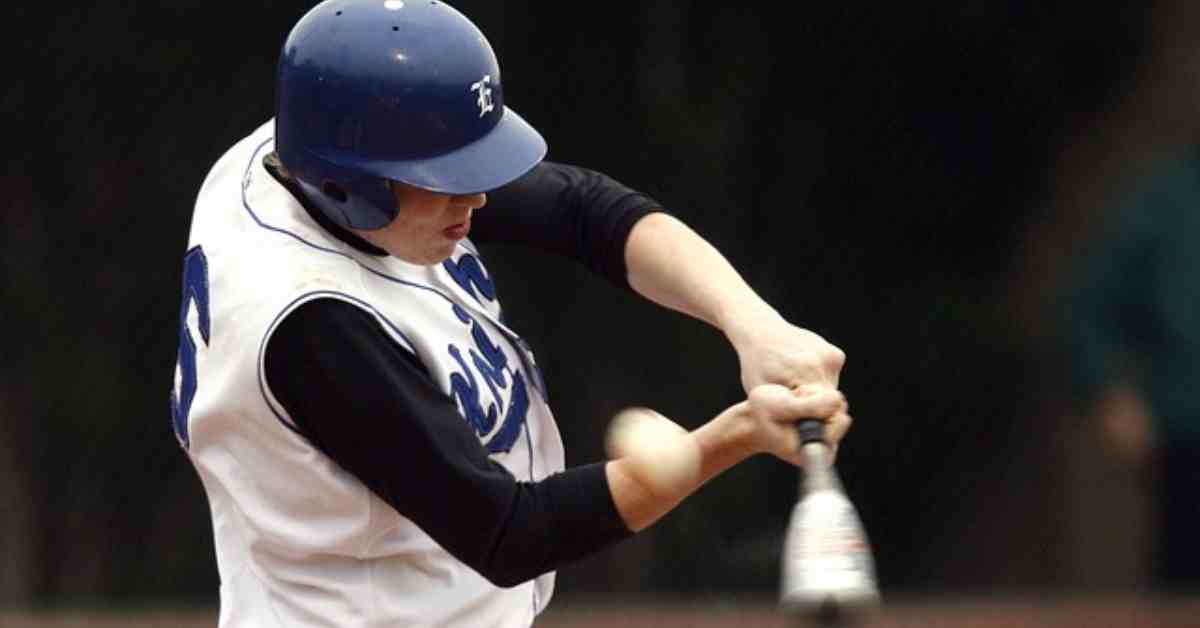 A utility player throwing a baseball on the field, showcasing versatility in both infield and outfield positions.