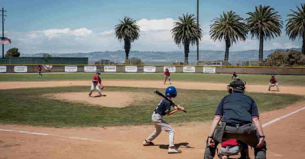 A group of young men playing a game of semi-pro baseball.