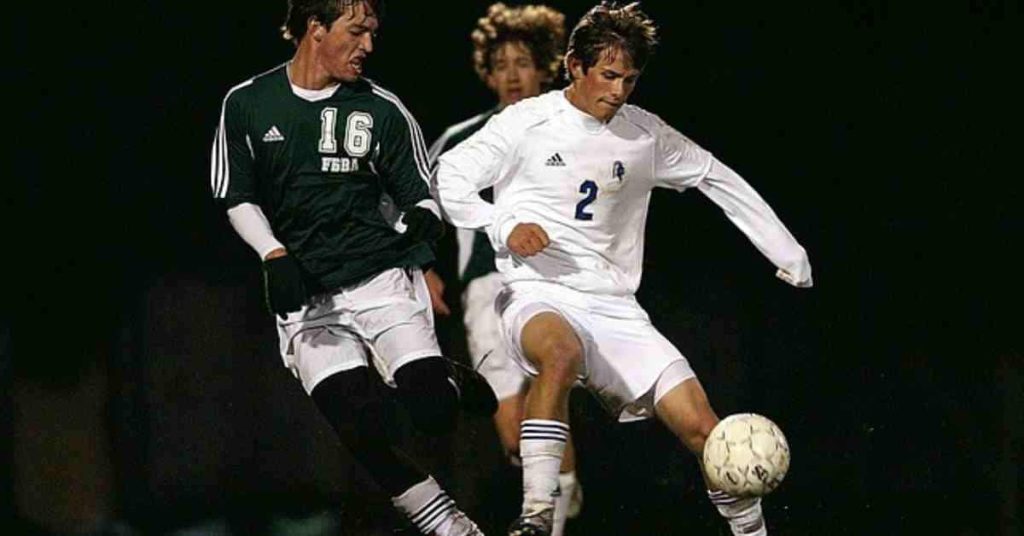 A couple of men playing a game of soccer, showcasing athleticism, what does ATH stands for in football.