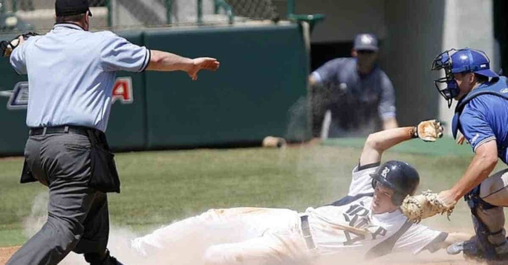 A fantasy baseball player sliding into a base during a game.