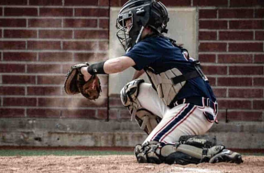 Fantasy baseball player holding a catcher's mitt on a field.