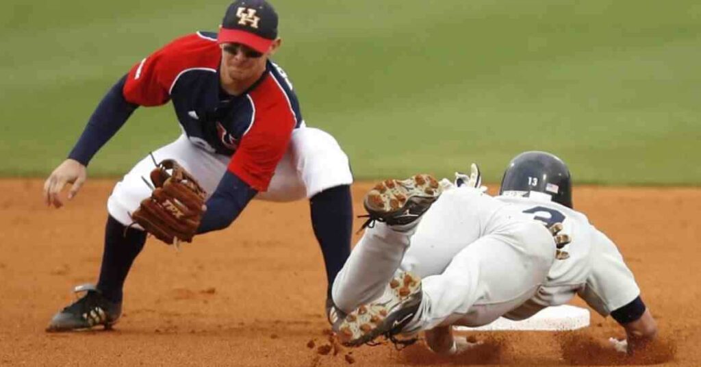 Andrew McCutchen sliding into a base during a baseball game.