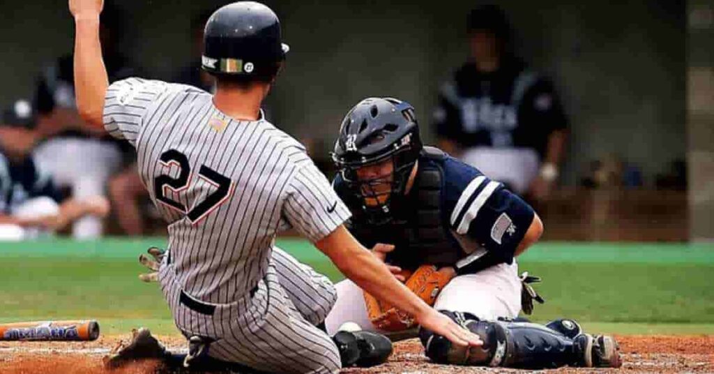 A Nationals top prospect baseball player sliding into home plate during a game.