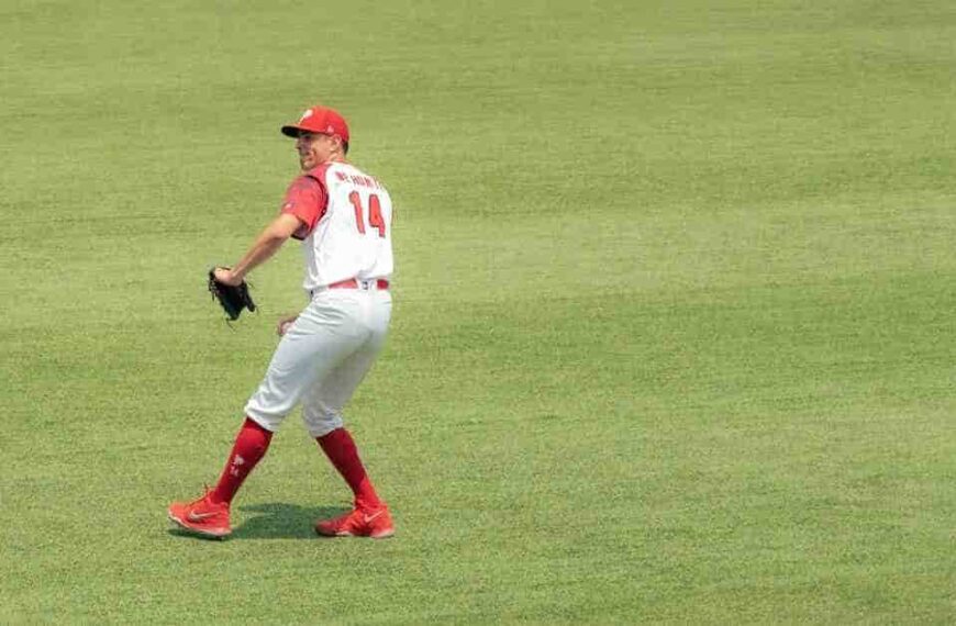 Yariel Rodriguez, a baseball player, standing on top of a field.