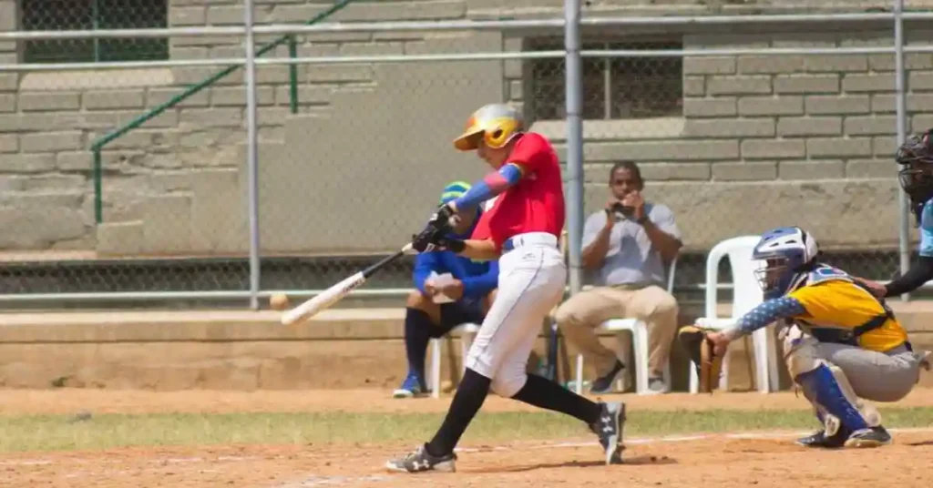 a baseball player swinging a bat at a ball, showcasing the skills of the oldest players